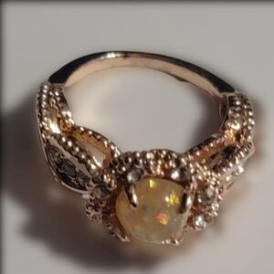 ROSE gold tone ring opal cream ring approximately 5.5. See last pic